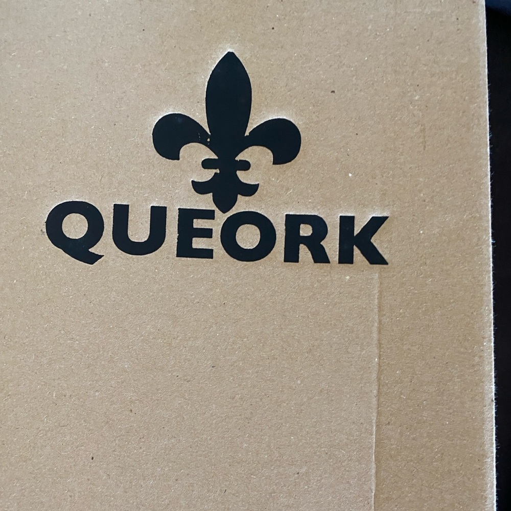 Queork Brown Box with Black Logo. Cork heals from Portugal